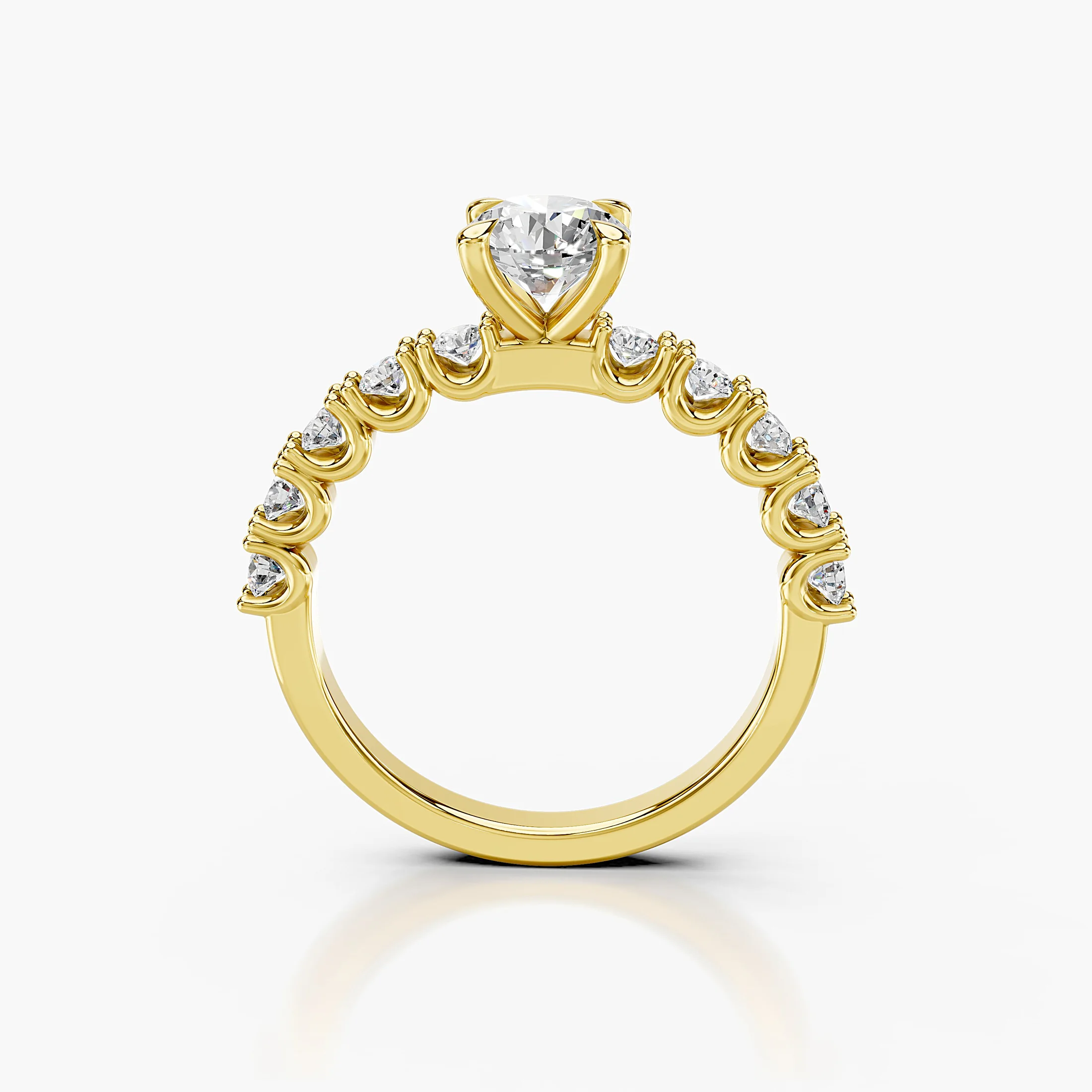 Round center-stone engagement ring with graduated round diamonds set along the shank.