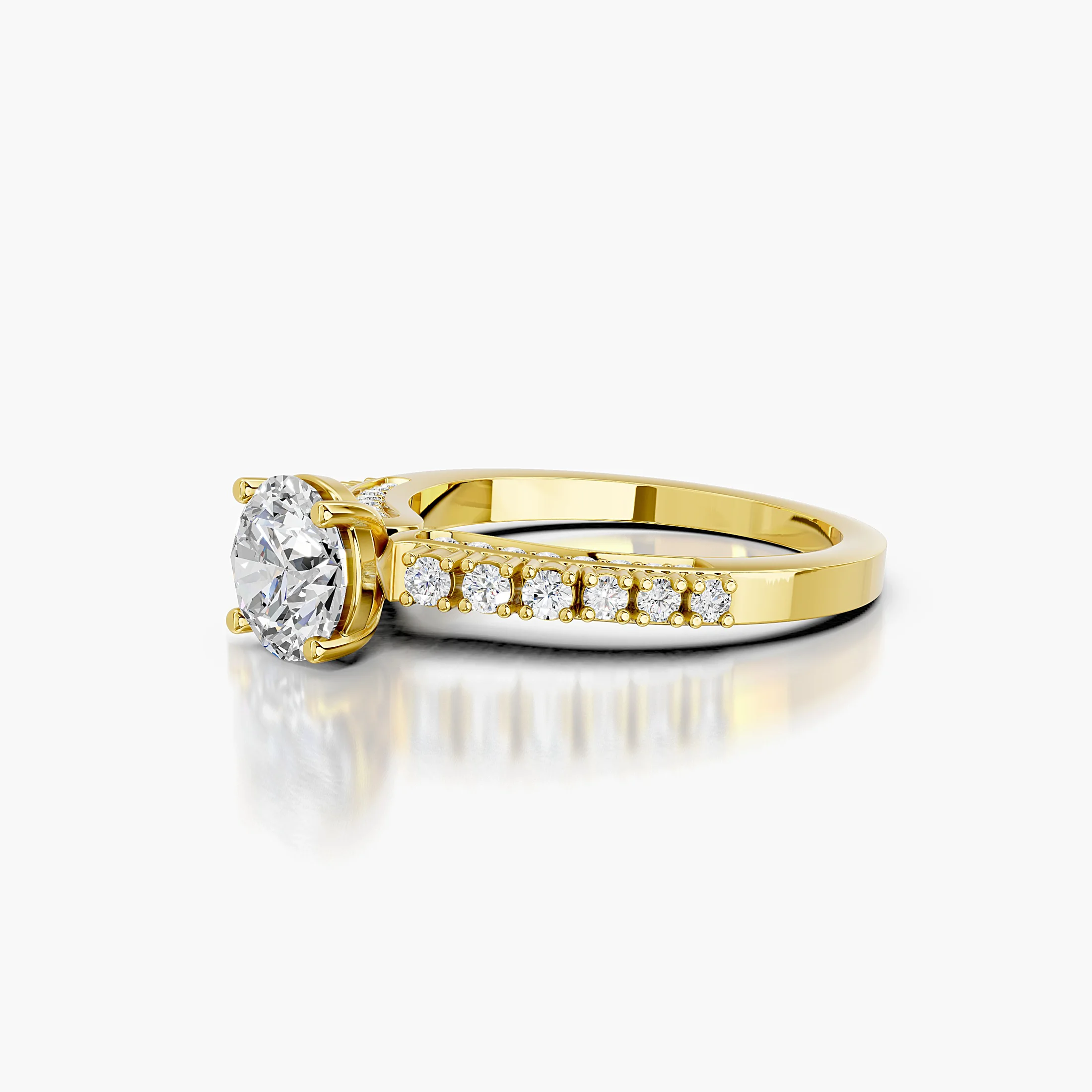 Side view showing the raised four-prong center and layered diamond shoulders