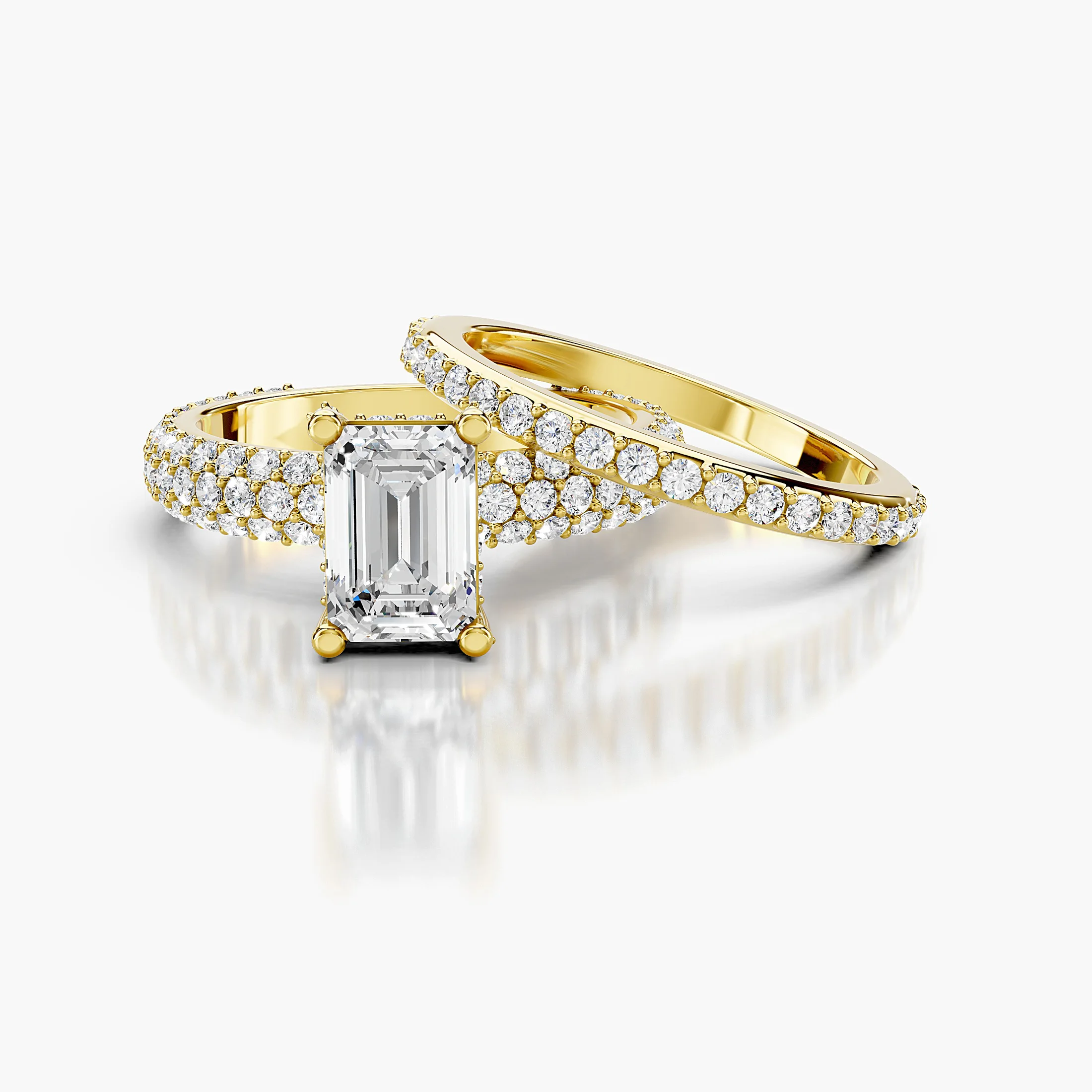 Emerald diamond pavé bridal set with a four-prong center and layered round diamond bands
