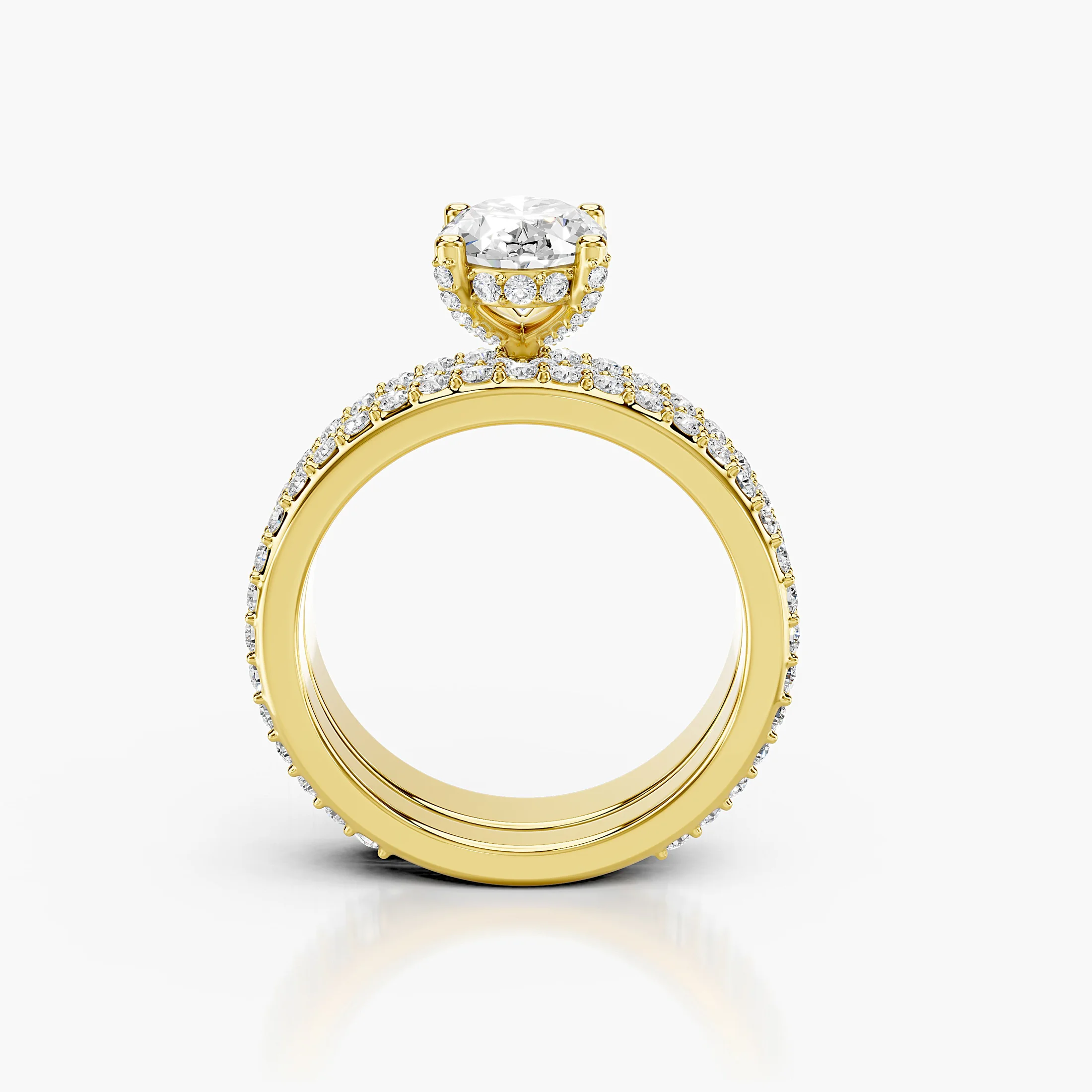 Oval diamond pavé bridal set with a four-prong center and layered curved diamond bands