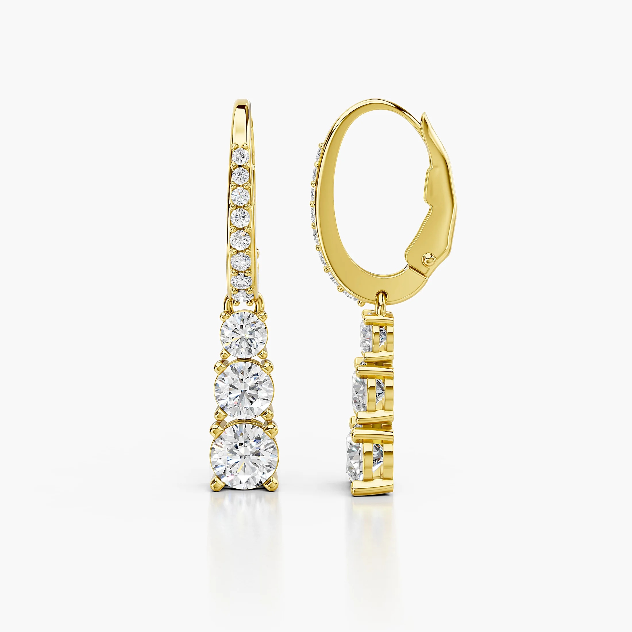 Graduated round diamond drop earrings with leverback clasps