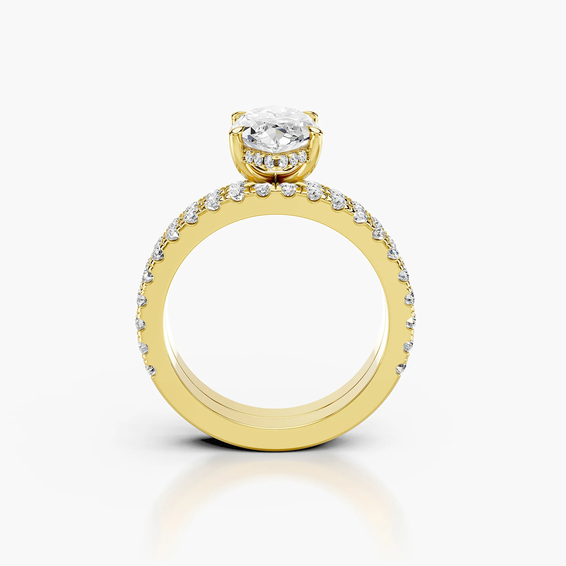 Marquise center engagement ring with hidden halo, round side stones, and straight coordinating diamond wedding band