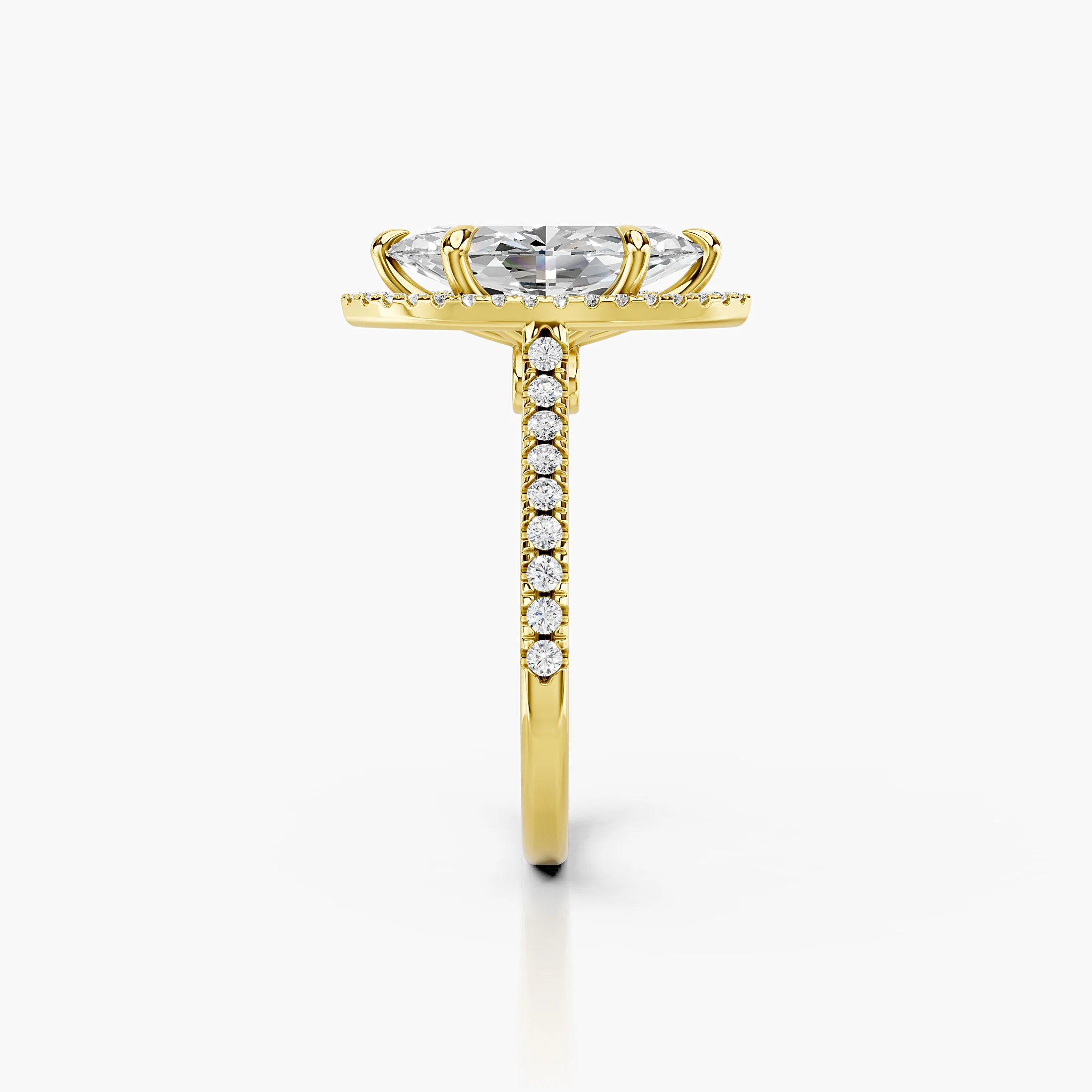 Marquise-cut lab-grown diamond engagement ring with a matching halo and diamond-set band.