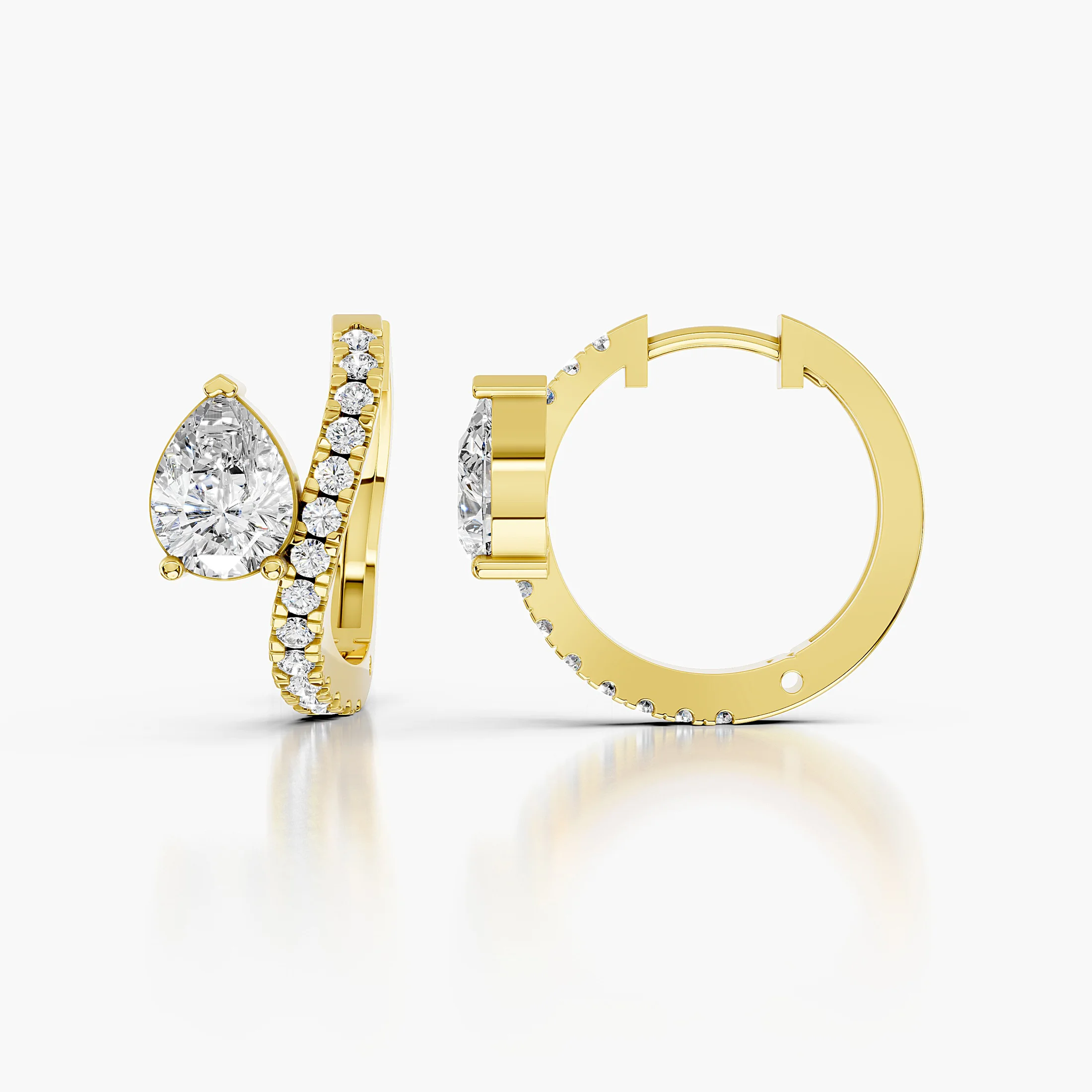 Pair of diamond hoop earrings with pear-shaped focal diamonds and round diamond accents