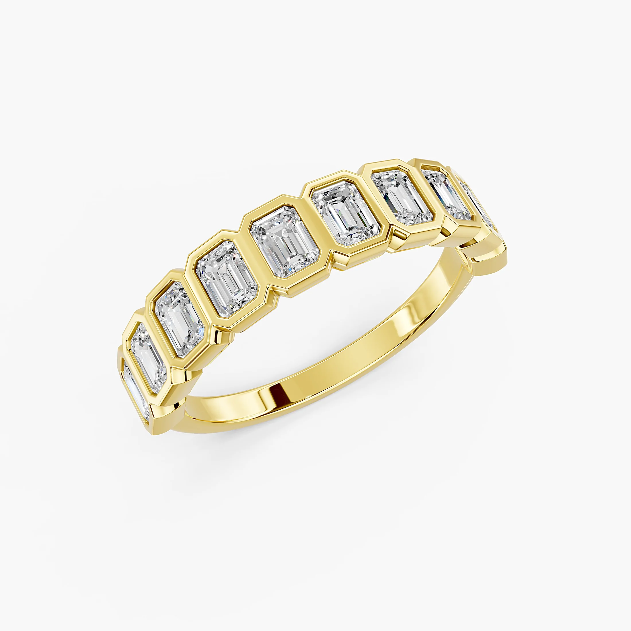 Half-eternity band featuring emerald-cut diamonds set in individual bezels across the ring.