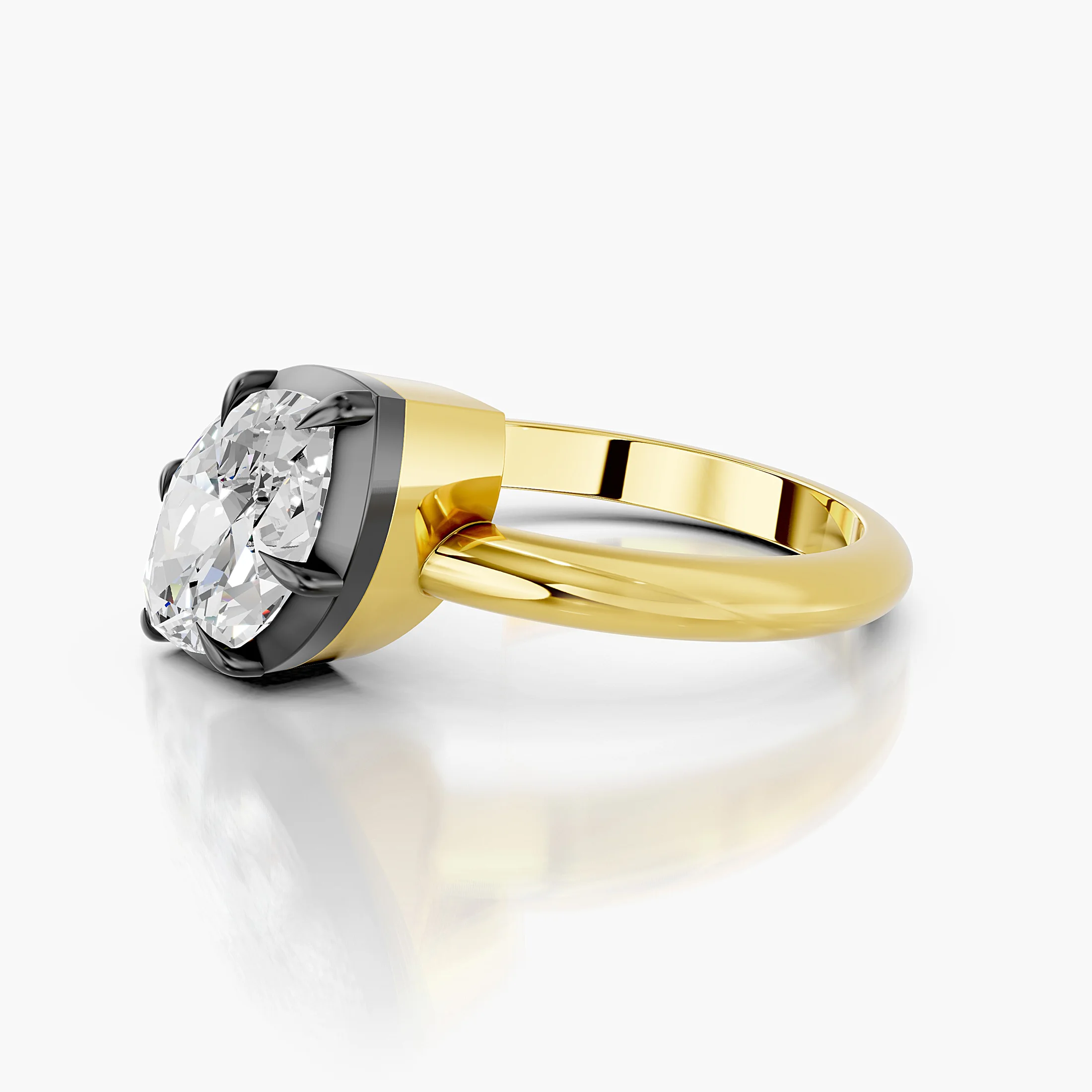 Marquise-cut diamond solitaire ring set in dark contrast prongs on a polished gold band.
