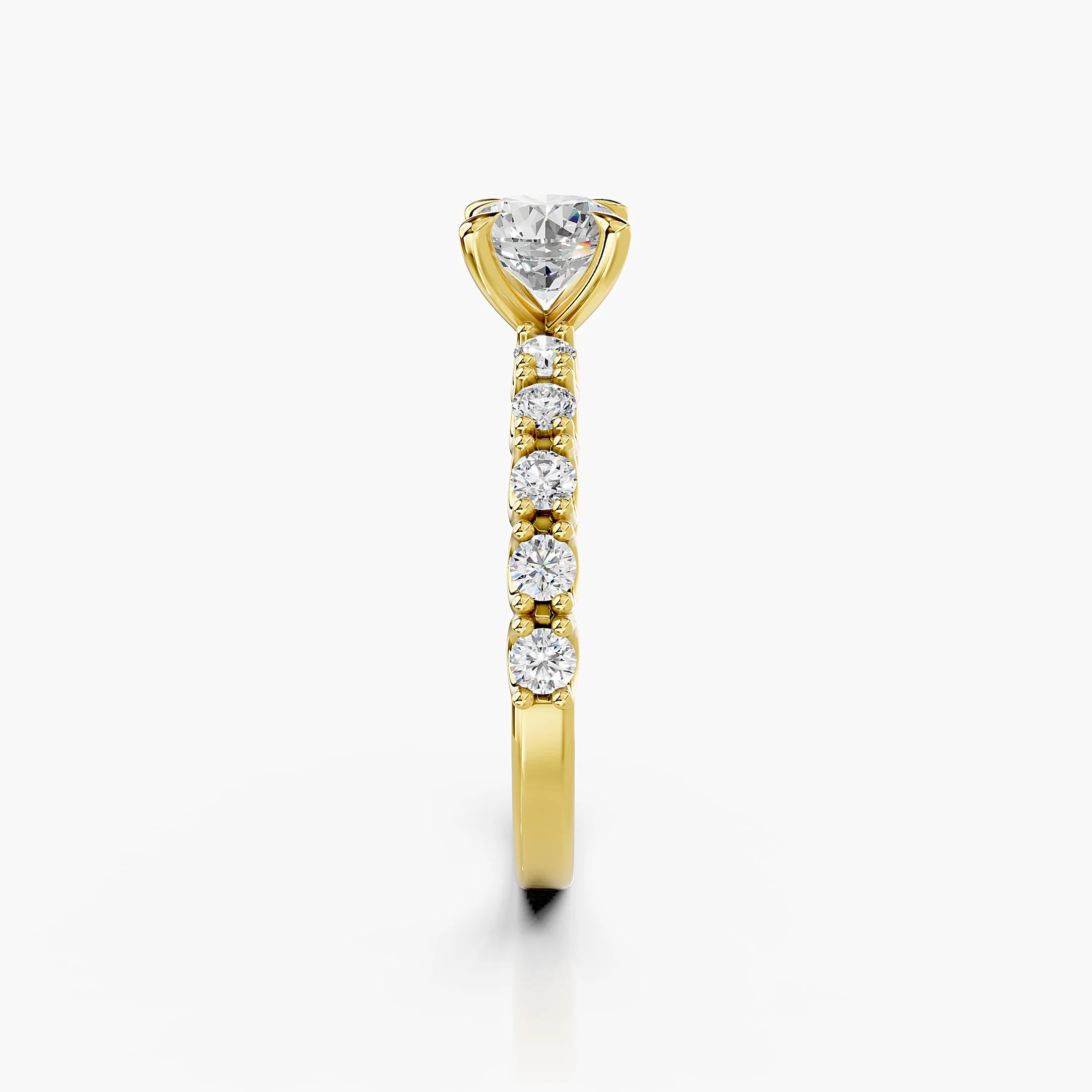 Round center-stone engagement ring with graduated round diamonds set along the shank.