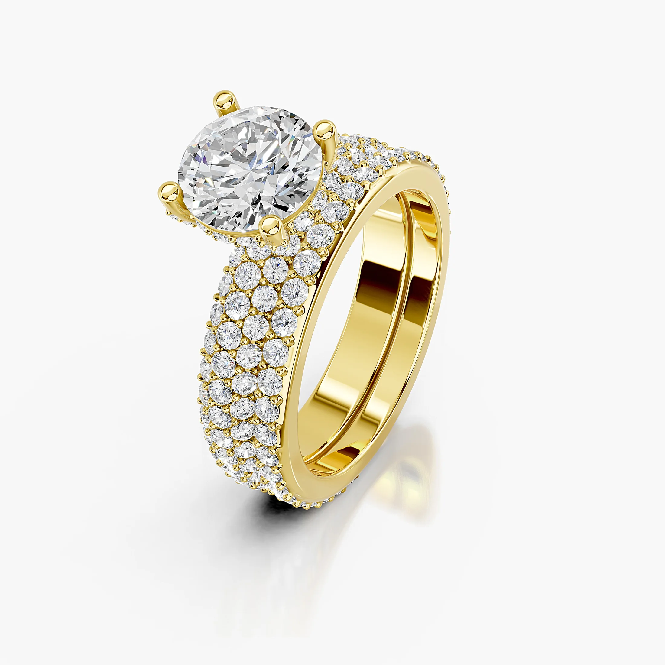 Round diamond pavé bridal set with a four-prong center and coordinating straight diamond band