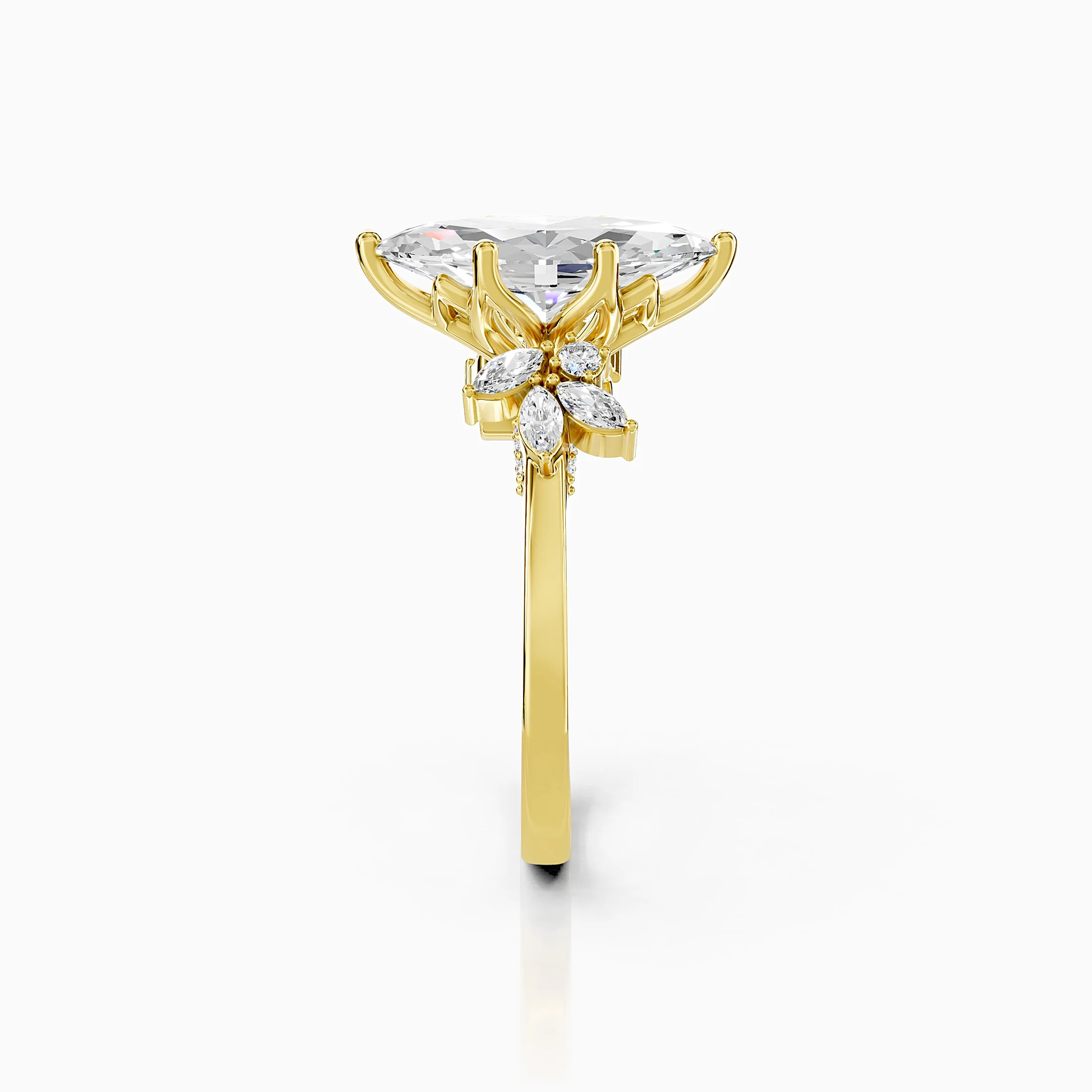 Marquise center-stone engagement ring with clustered round and marquise diamond accents.