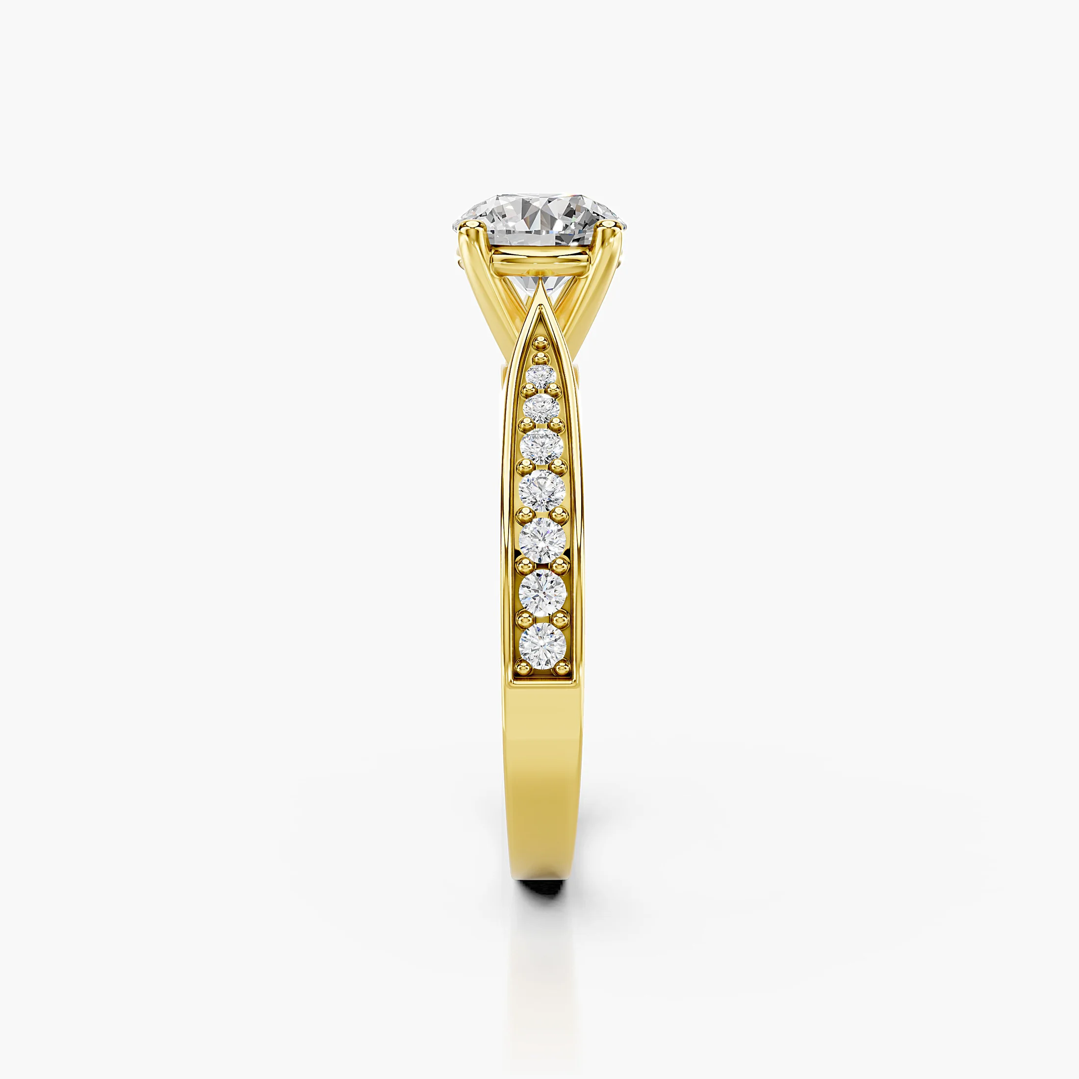 Round four-prong engagement ring with sculpted split shoulders and graduated side stones framed by polished rails.