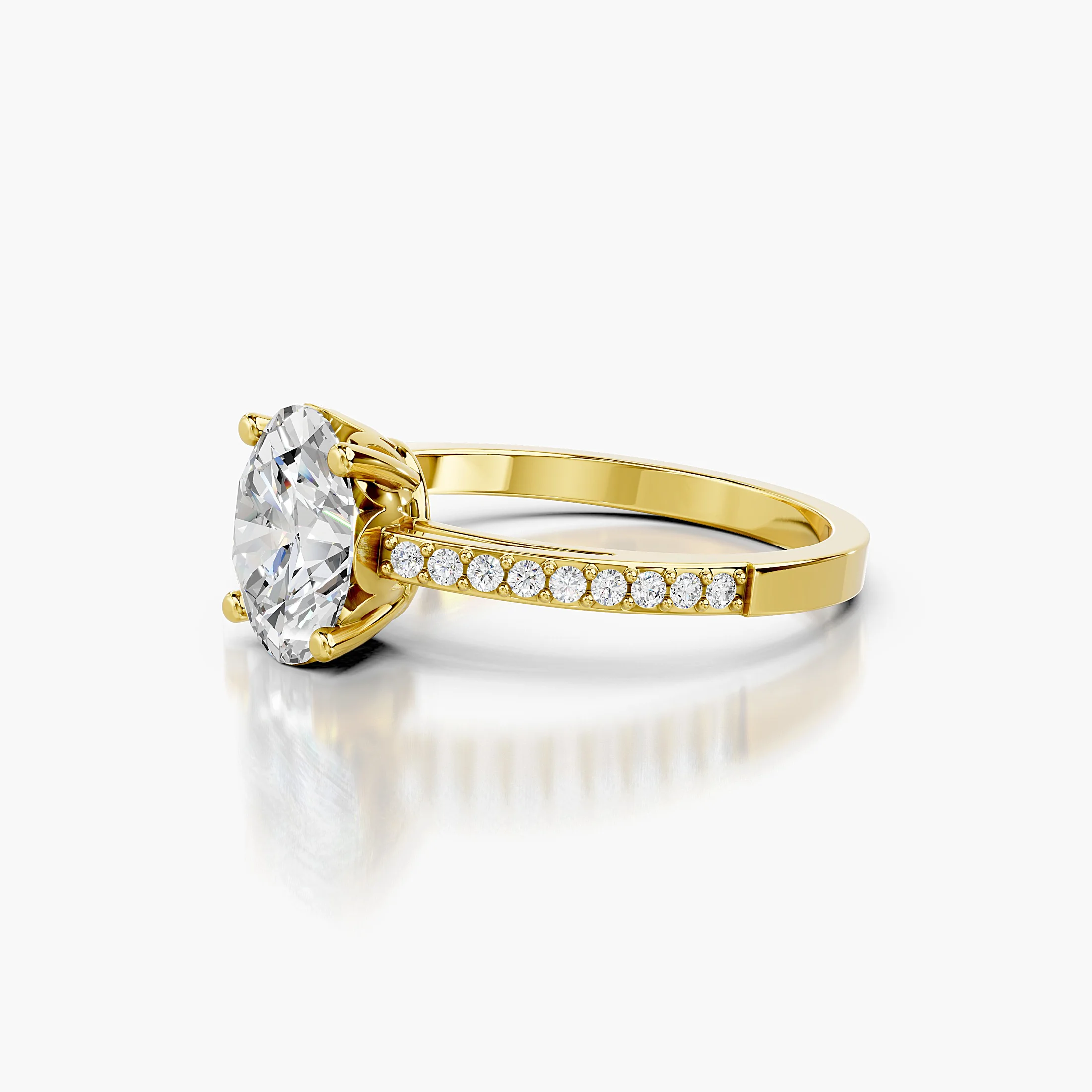 Oval diamond pavé engagement ring with a four-prong center and round diamond shoulders