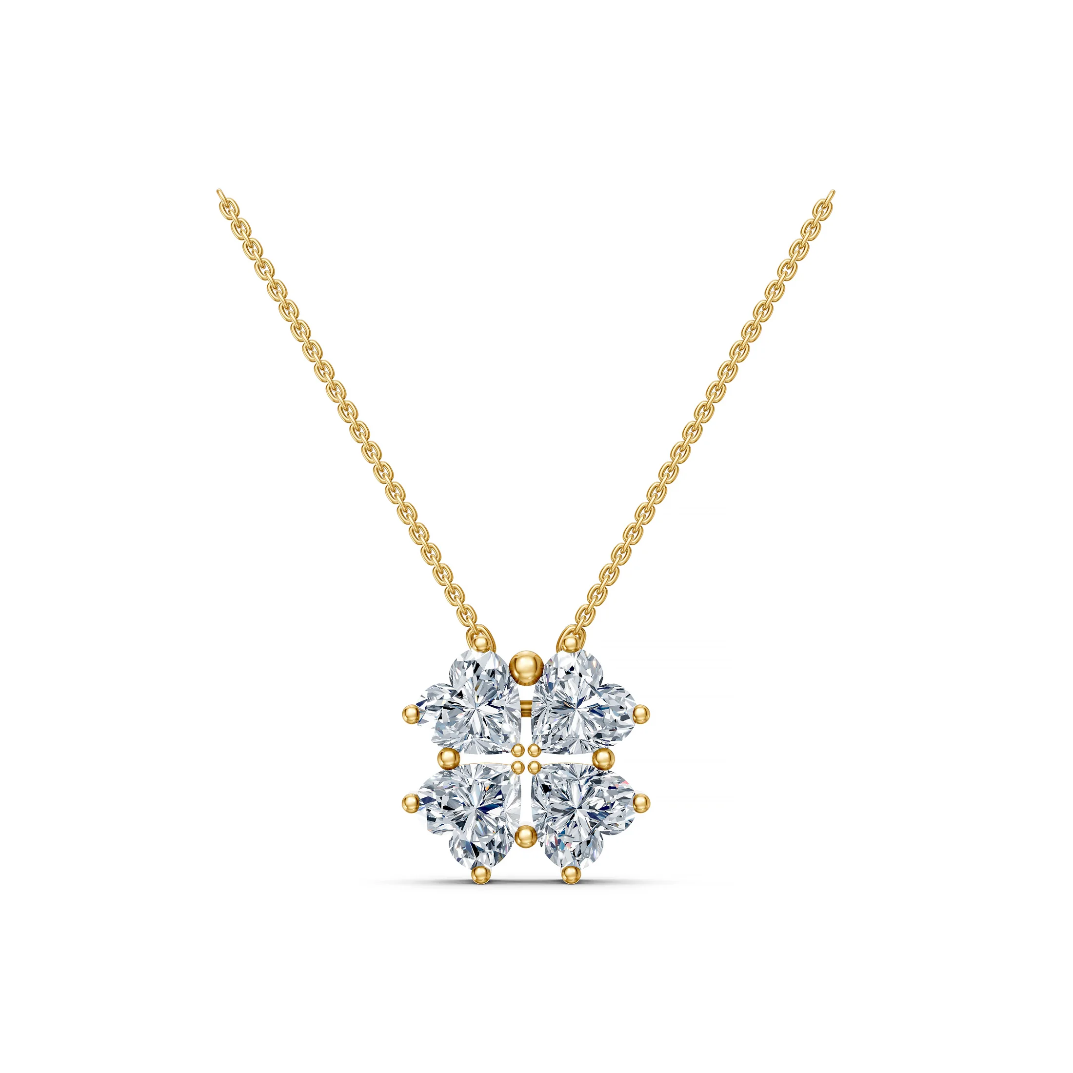 Four heart-shaped diamonds arranged as a clover pendant necklace