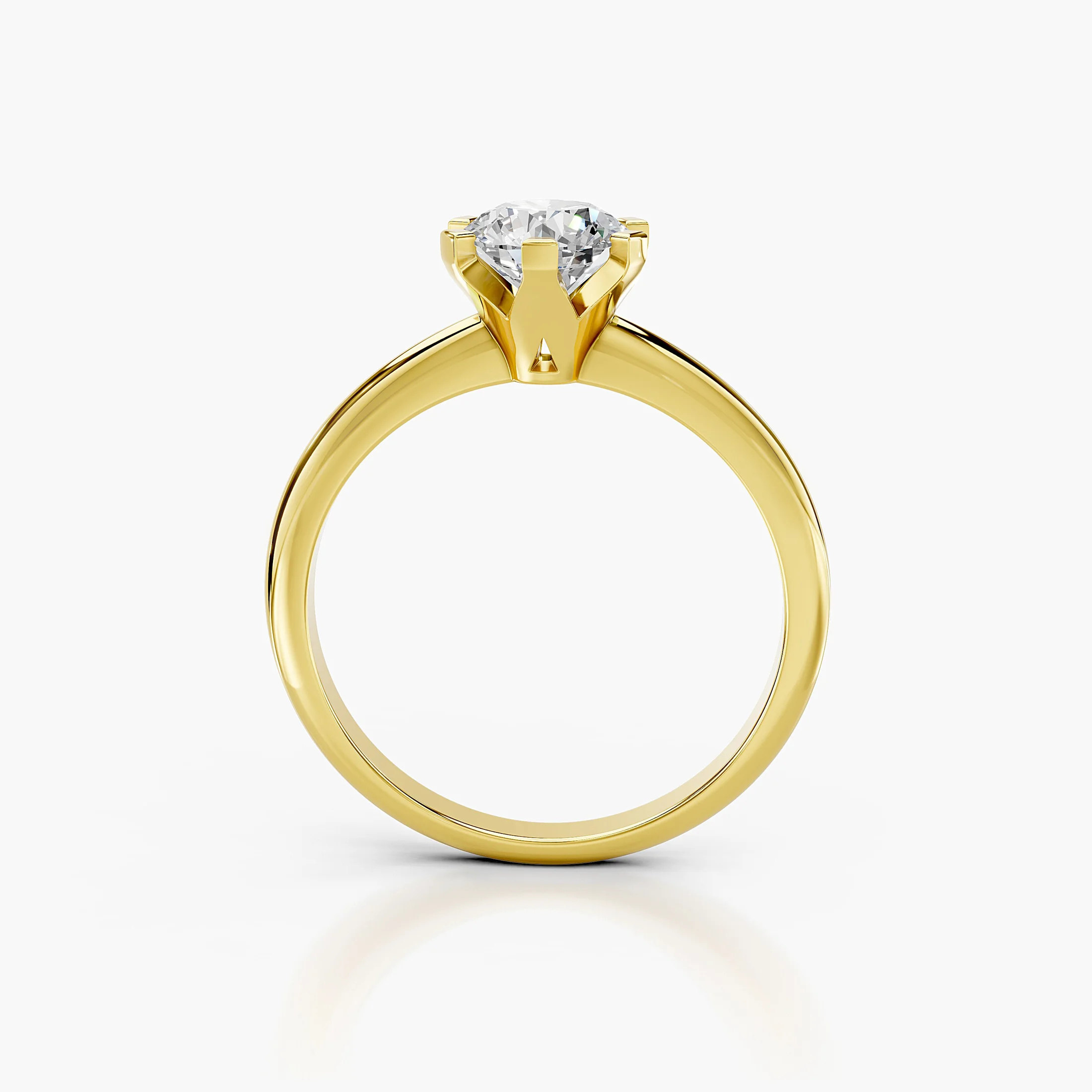 Round diamond solitaire ring held by angular eight-prong setting on a polished gold band.