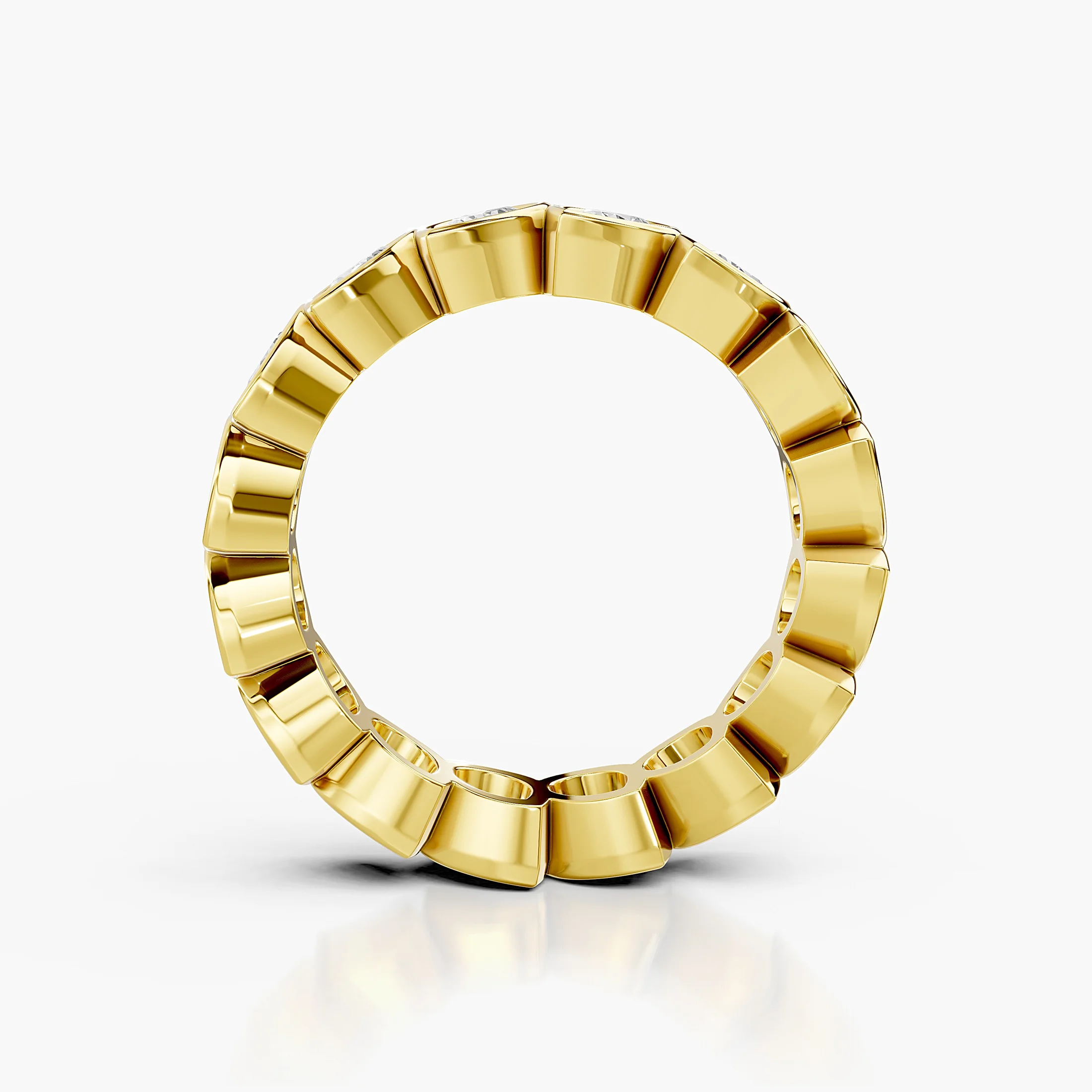 Full eternity band featuring pear-cut diamonds set in individual bezels around the ring.