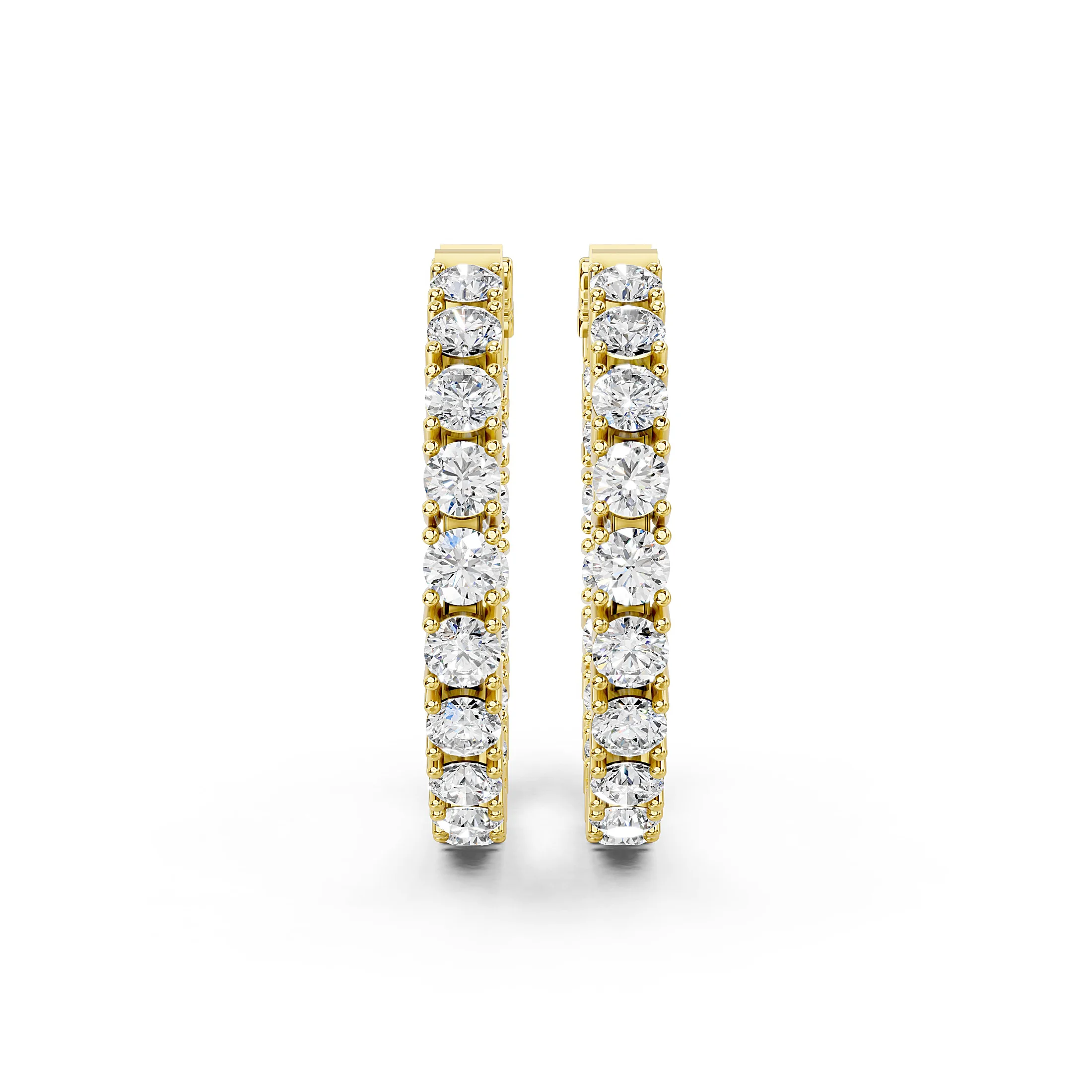 Pair of single-row round diamond hoop earrings with prong settings and hinged latch-back closures.