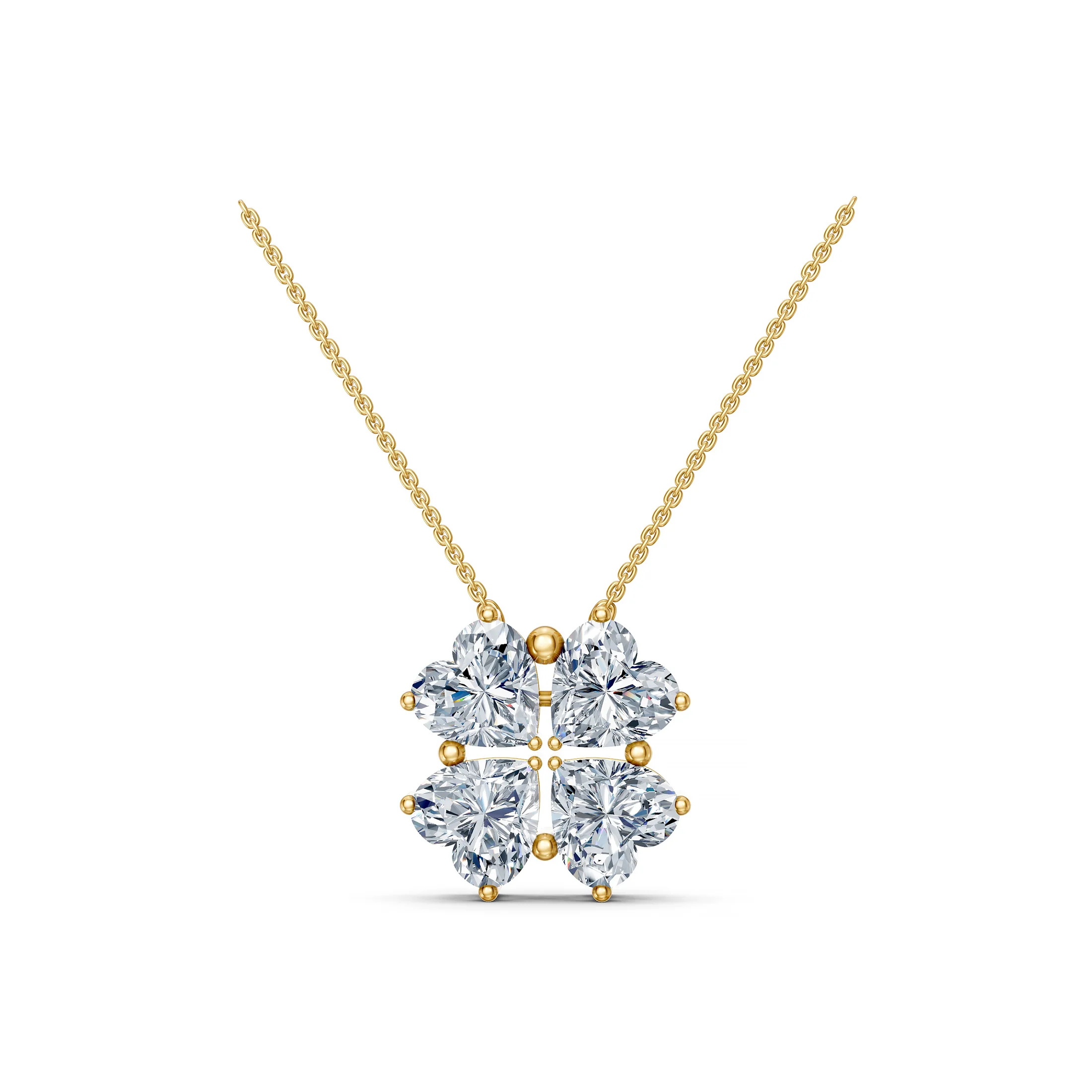 Four heart-shaped diamonds arranged as a clover pendant necklace