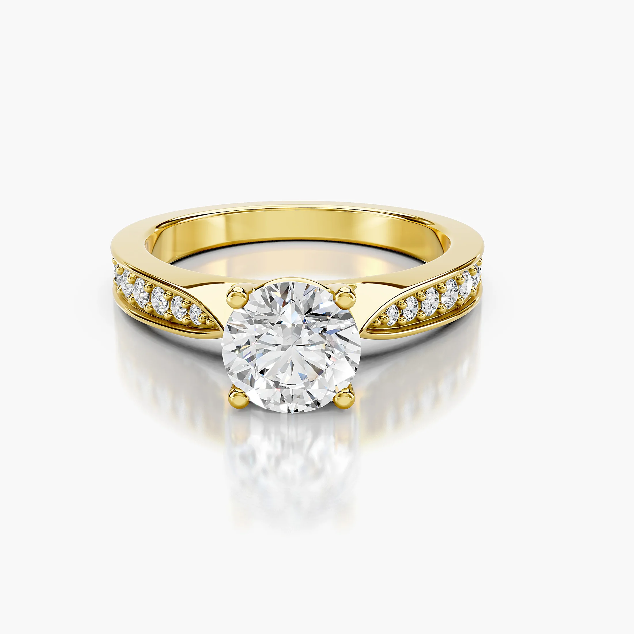 Round four-prong engagement ring with sculpted split shoulders and graduated side stones framed by polished rails.