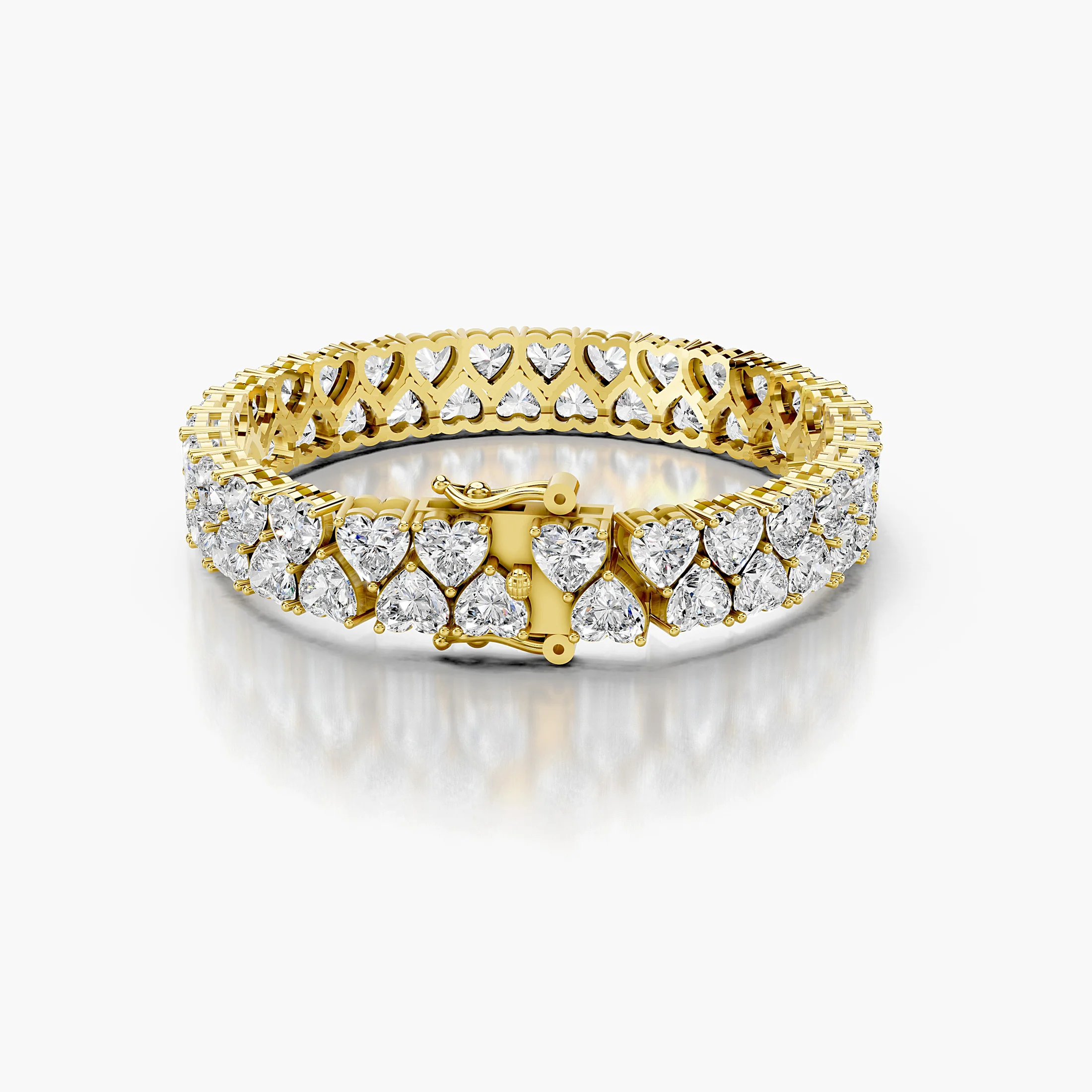 Two-row heart-shaped diamond tennis bracelet with articulated links and a concealed box clasp with dual safety latches.