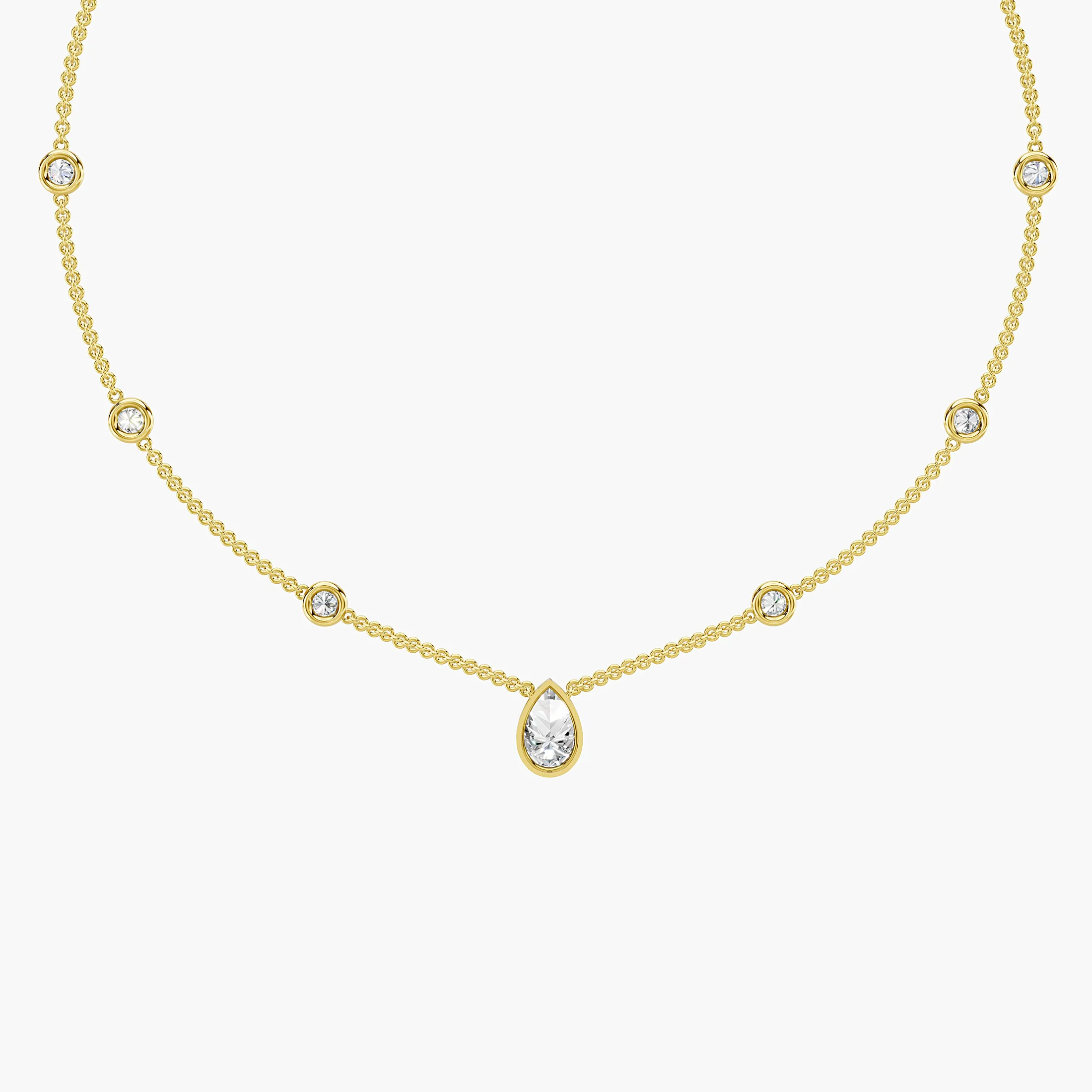 Pear-shaped diamond drop necklace with six round diamond stations spaced along a delicate chain.