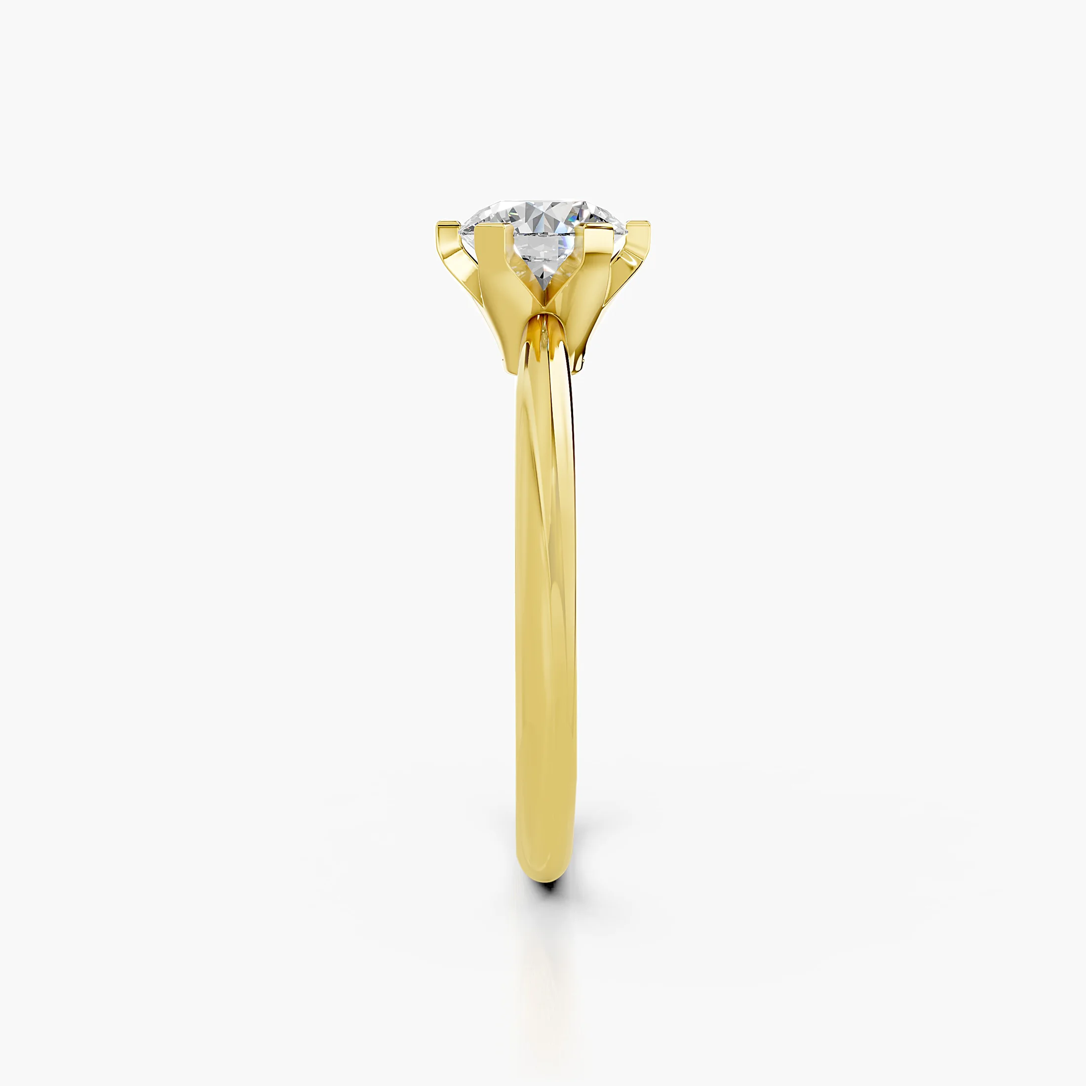 Round diamond solitaire ring held by angular eight-prong setting on a polished gold band.