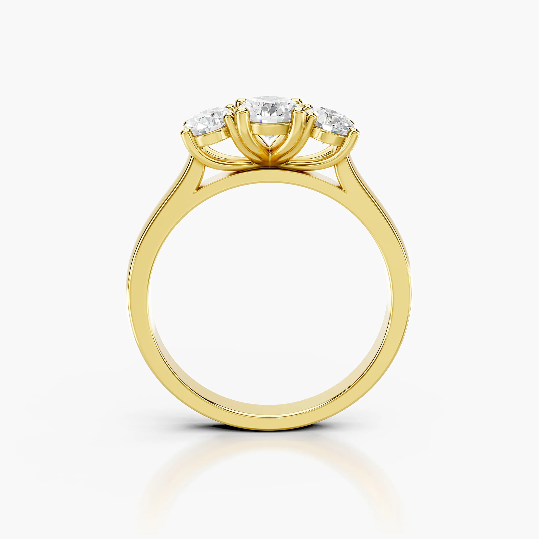 Three-stone engagement ring featuring a center oval diamond flanked by two matching oval diamonds.