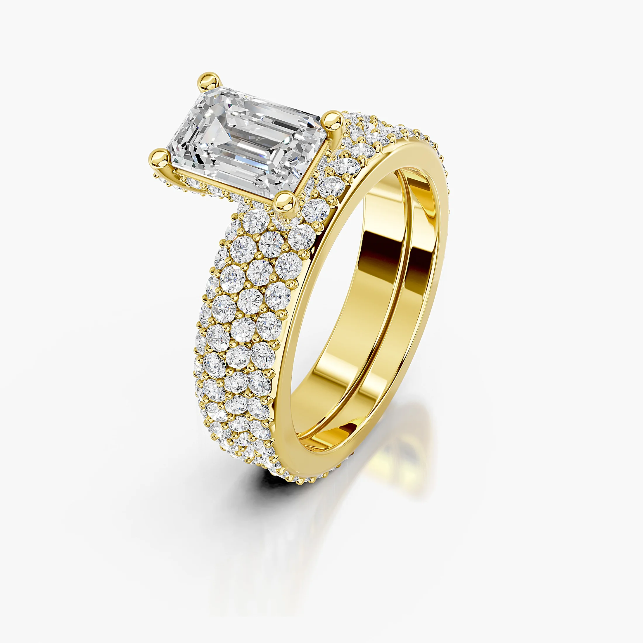 Emerald diamond pavé bridal set with a four-prong center and layered round diamond bands