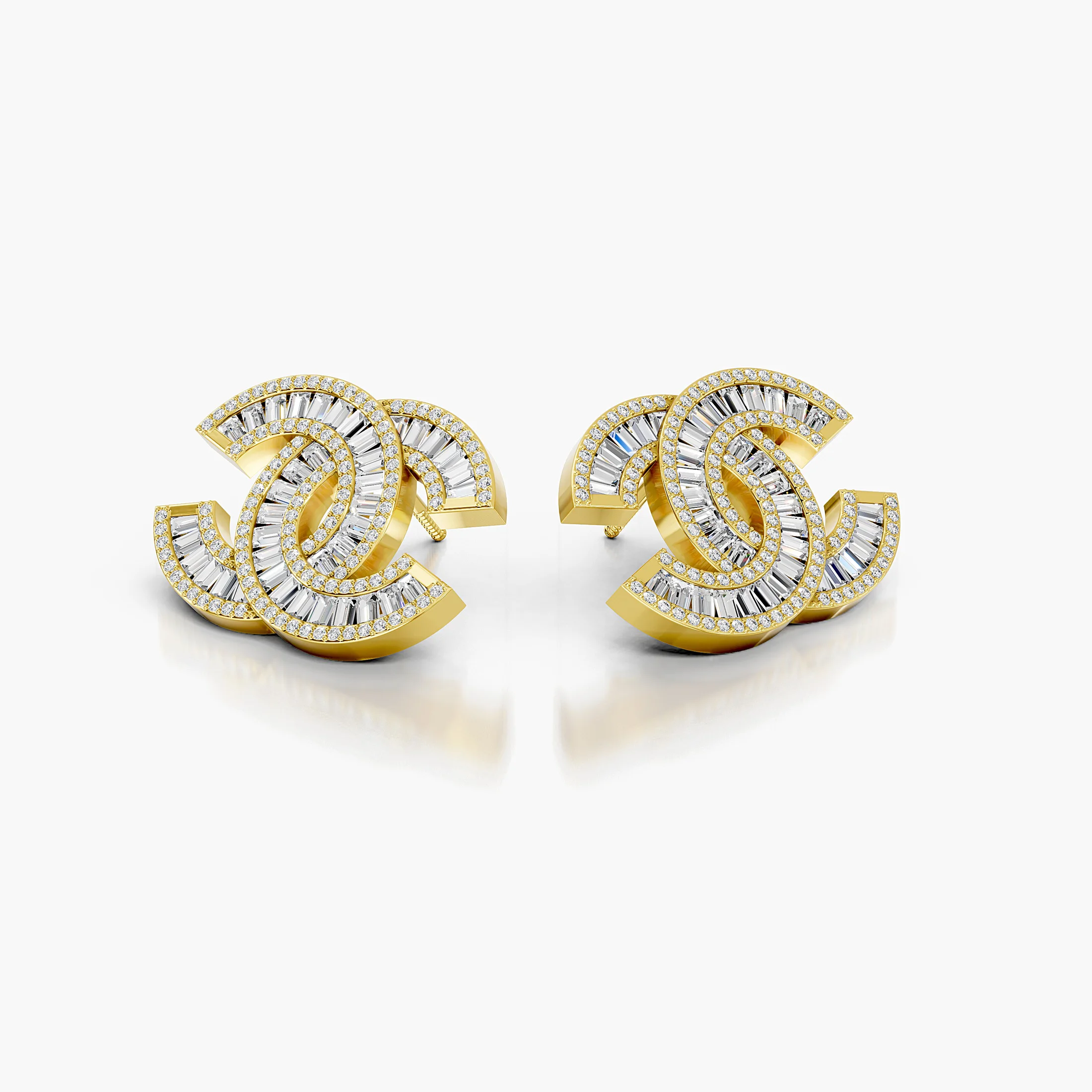 Interlocking motif statement stud earrings with round and tapered baguette diamonds
