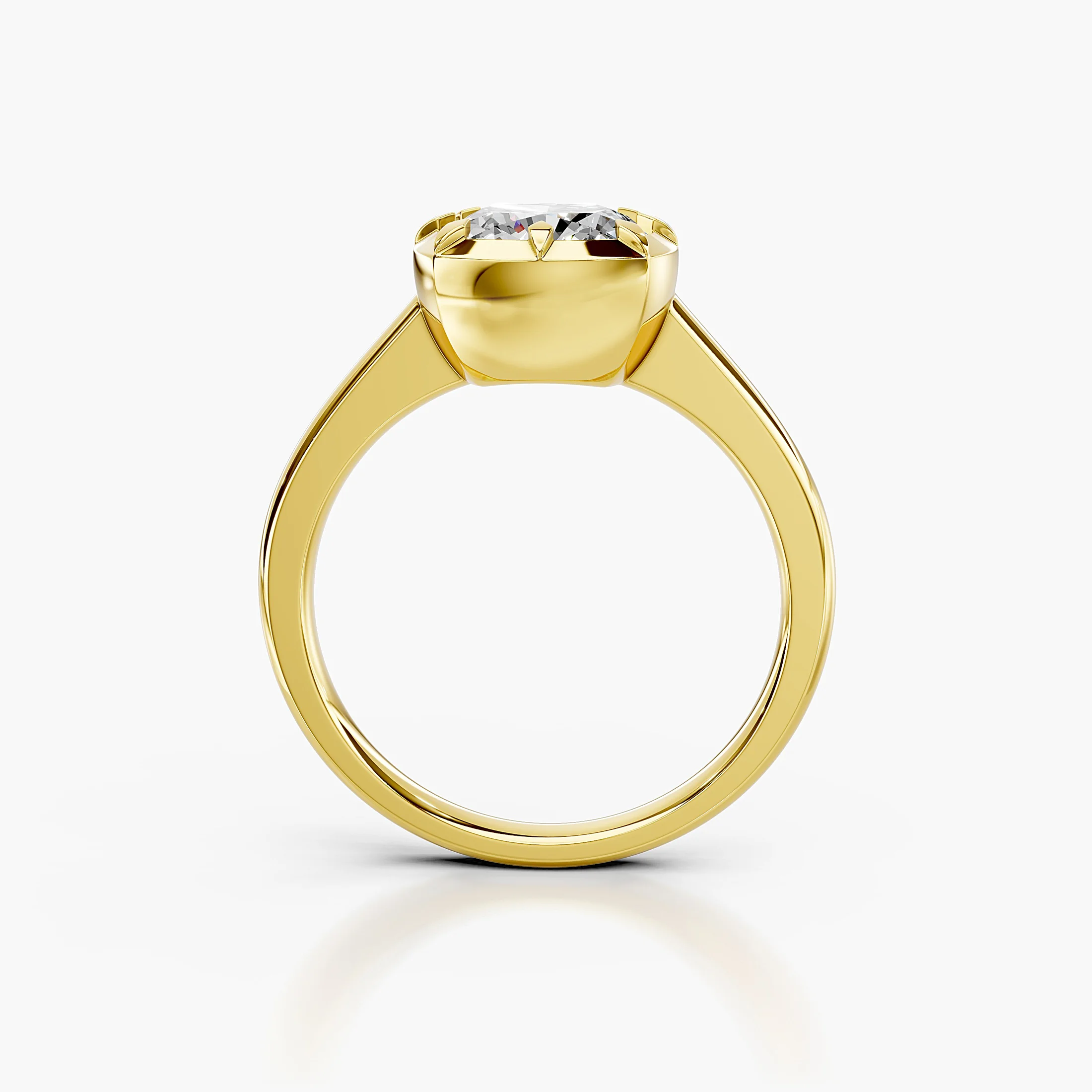 Cushion-cut diamond solitaire ring set in a notched bezel on a polished gold band.