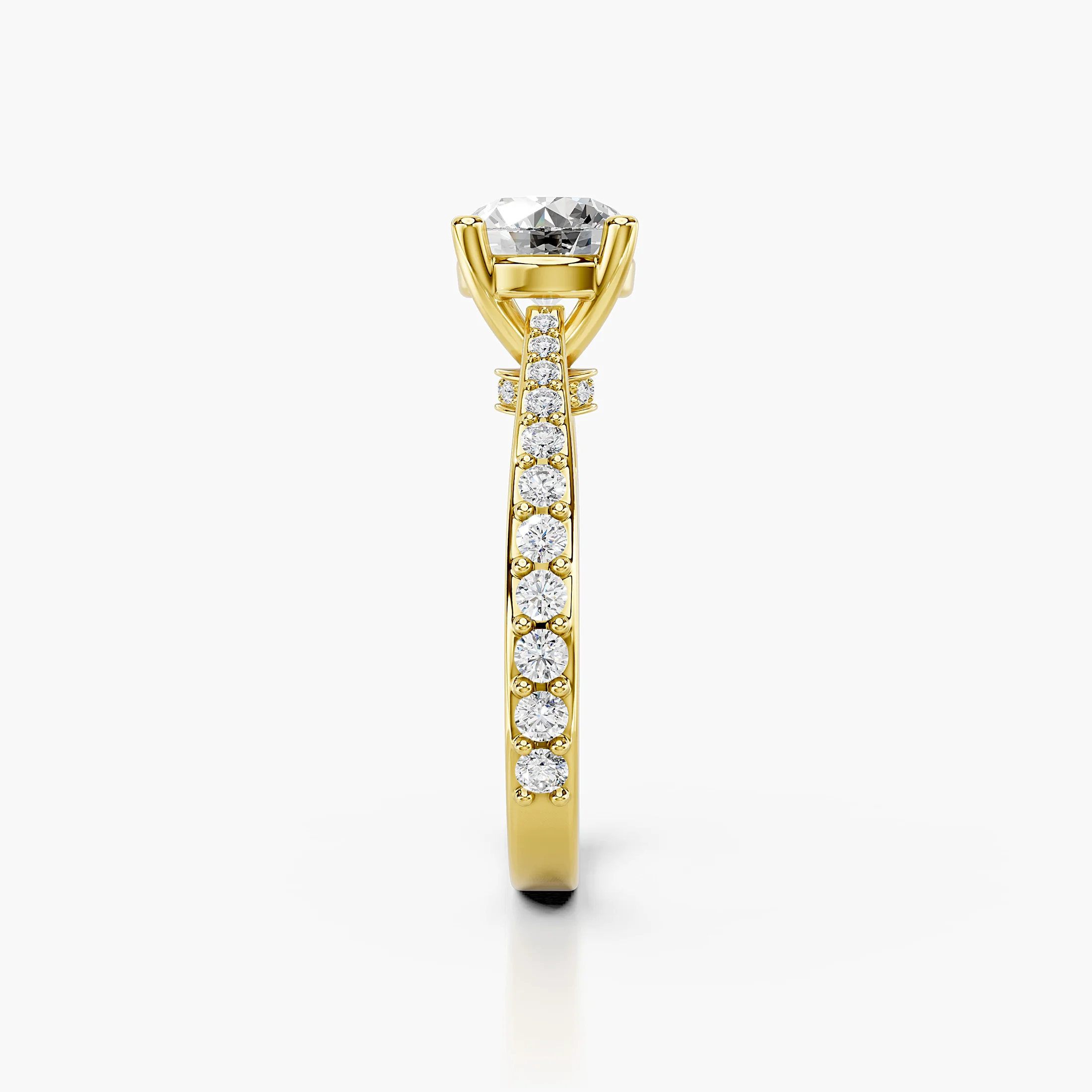 Round centre diamond in a raised four-prong setting with graduated round side stones and a diamond-accented gallery