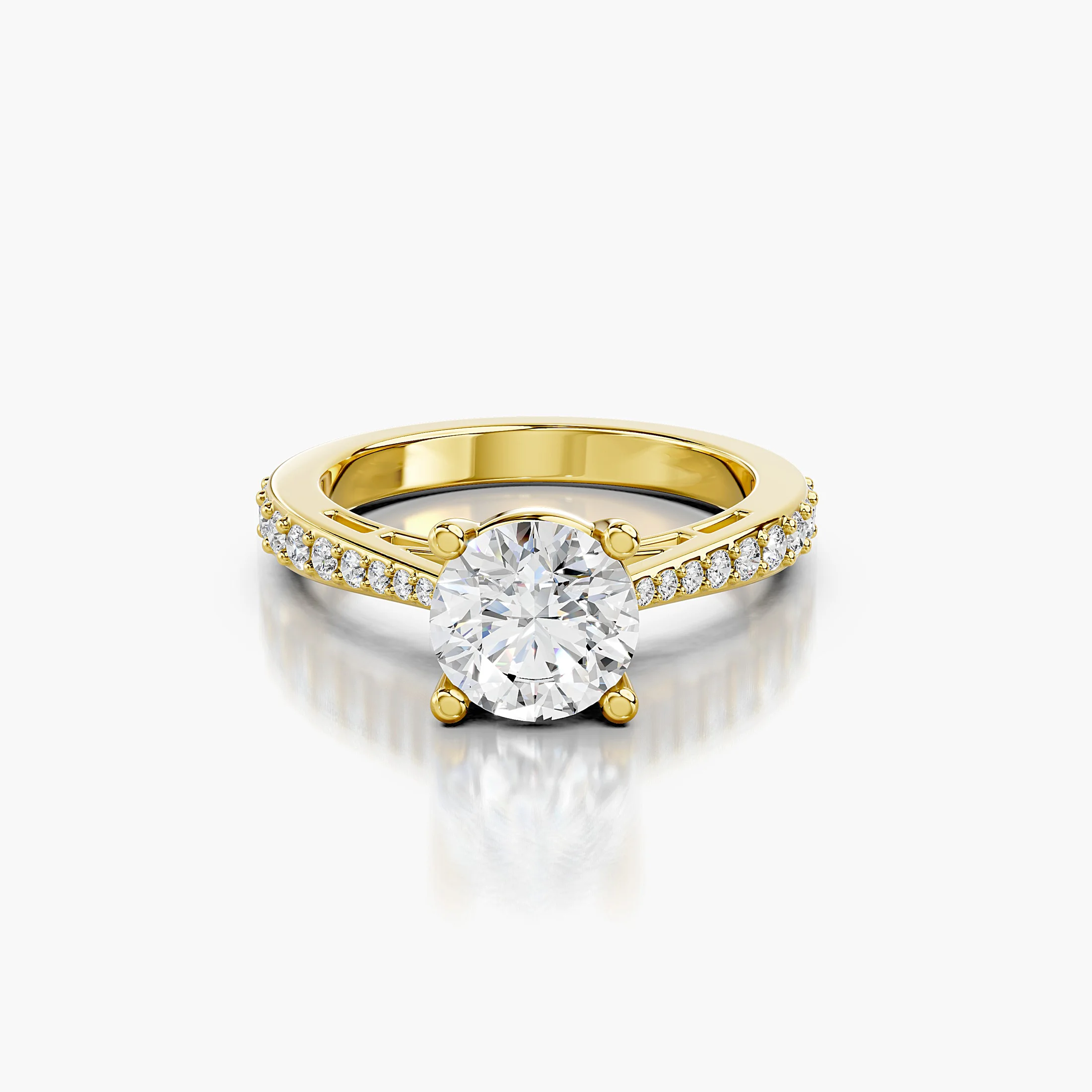Round centre diamond in a raised four-prong setting with graduated round side stones and a diamond-accented gallery